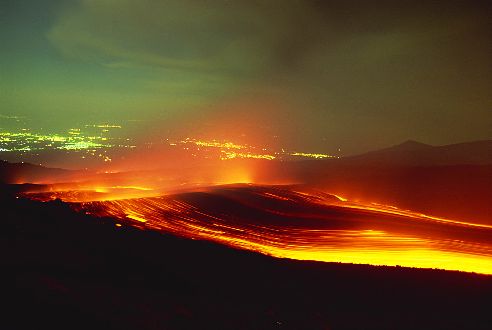 Lava flow from the Monti Calcarazzi fissure on the southern flank of Mount Etna in 2001, threatening the town of Nicolosi below, Sicily, Italy, Europe