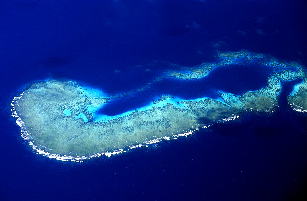 Aerial view of surf breaking on the windward side of coral reef, North West Coast, Viti Levu, FijiFiji's biggest island