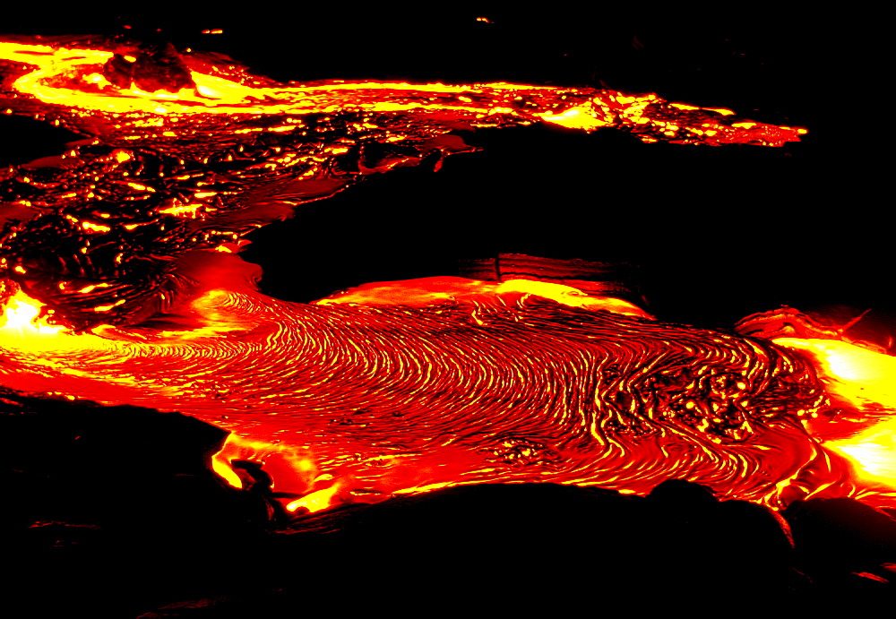 Flow of pahoehoe or 'ropey lava' near the Chain of Craters Road on the slopes of  Mt Kilauea volcano, in the south of this, the most volcanically active Hawaiian island, The Big Island, Hawaii, Usa