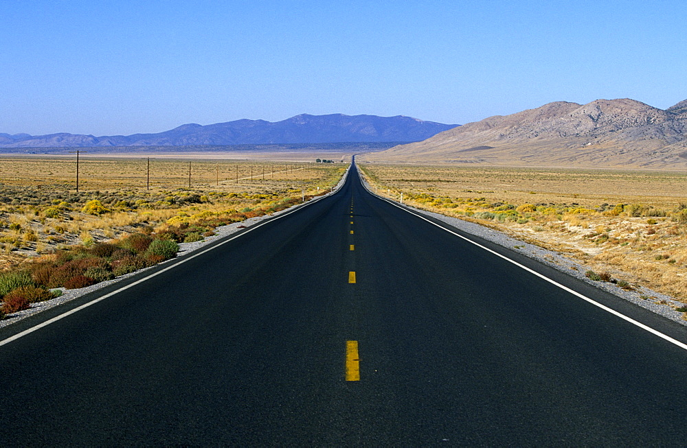 Highway 50 - 'The Loneliest Road in America' that crosses Nevada's desert landscape west to east from California to Utah, The Great Basin, Nevada, USA