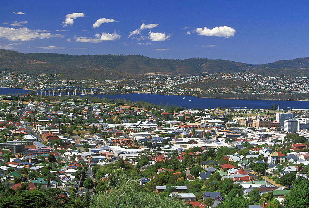 Looking north east across the centre of the state capital towards the Queen's Domain, the Tasman Bridge and the River Derwent, Hobart, Tasmania, Australia, Pacific