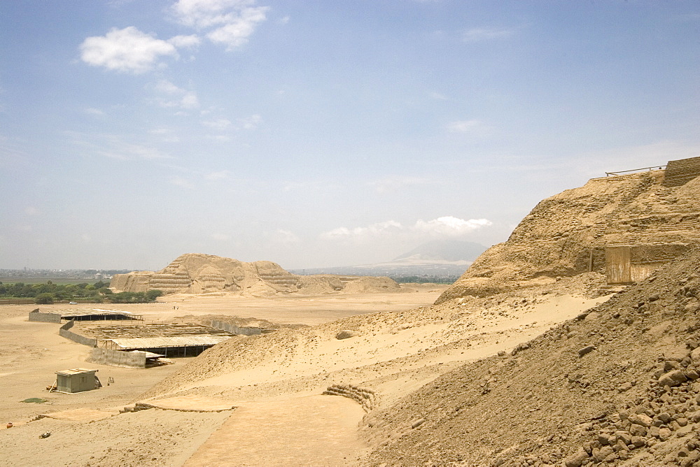 Looking from the Huaca de la Luna towards the Huaca del Sol, another adobe brick temple pyramid of the Moche people (100BC-AD850) and probably the largest adobe structure in pre-Columbian America, the Huacas, Trujillo, Peru, South America