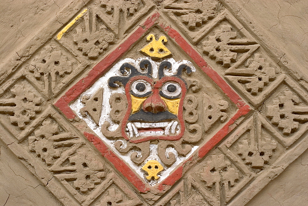 Rhomboid design with demon's face in the well-preserved murals at this adobe brick temple pyramid of the Moche people (100BC-AD850) in the desert north, Huaca de la Luna, Trujillo, Peru, South America