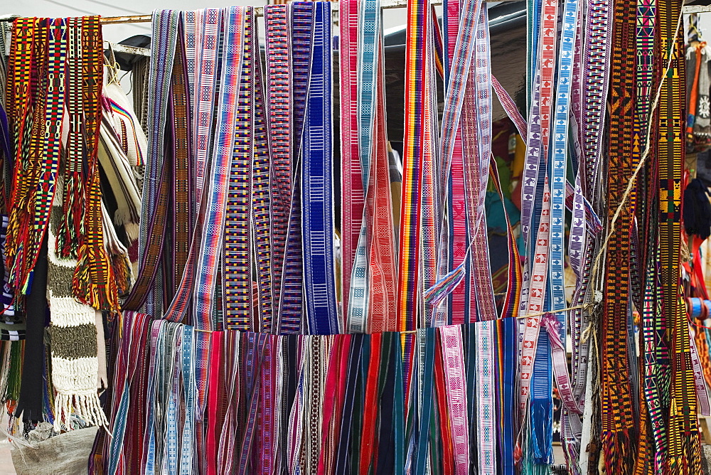 Colourful indigenous-style textiles on sale in this major tourist hub and colonial-style provincial capital, Riobamba, Chimborazo Province, Central Highlands, Ecuador, South America