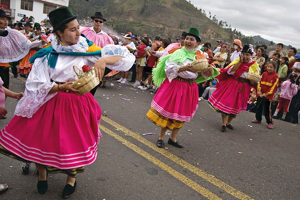 Dancers in traditional clothing at Carnival, one of the biggest in Ecuador, in the town of Guaranda, Bolivar Province, Ecuador, South America