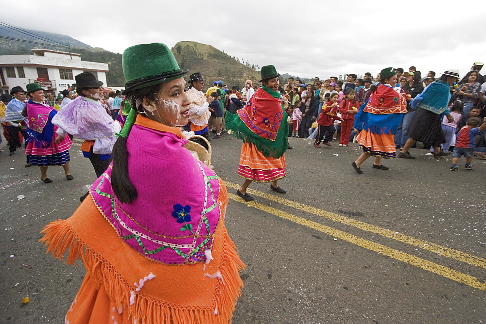 Dancers in traditional clothing at Carnival, one of the biggest in Ecuador, in the normally quiet provincial town of Guaranda, Bolivar Province, Ecuador, South America