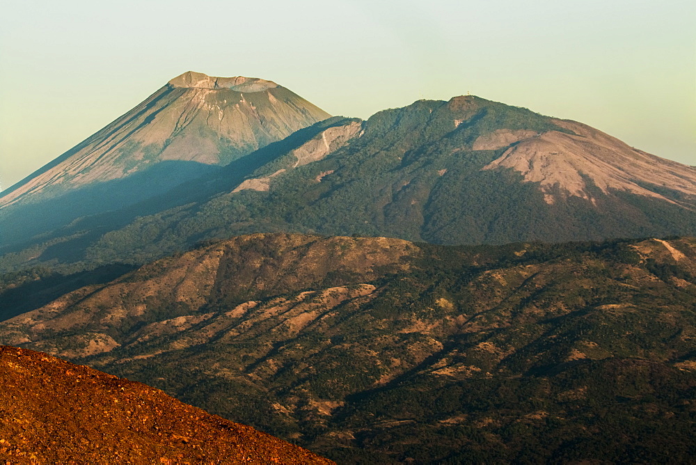 Summit of 1745m active Volcan San Cristobal on left, the country's highest volcano, and Volcan Casita on the right, Chinandega, Nicaragua, Central America