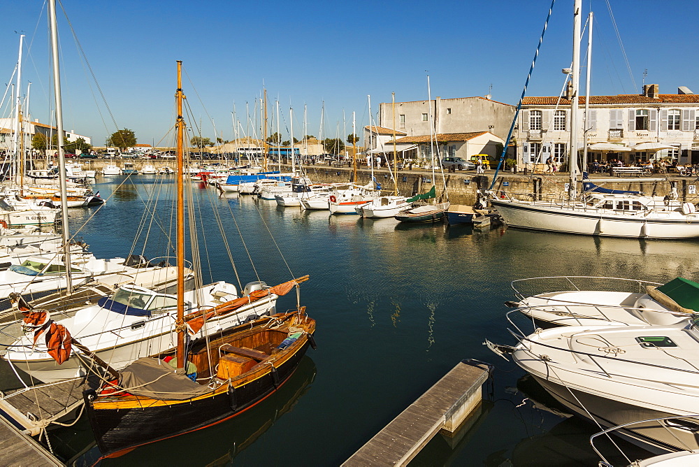 Yachts moored at the Quai de Bernonville in this north coast town, Saint Martin de Re, Ile de Re, Charente-Maritime, France, Europe