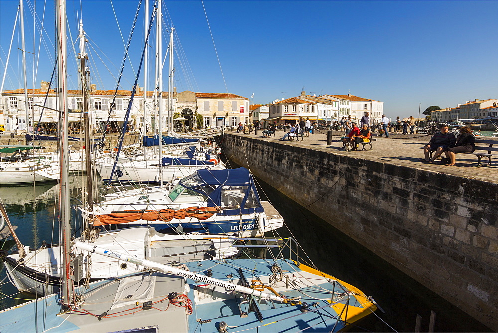 Yachts moored at the Quai de Bernonville in this north coast town, Saint Martin de Re, Ile de Re, Charente-Maritime, France, Europe