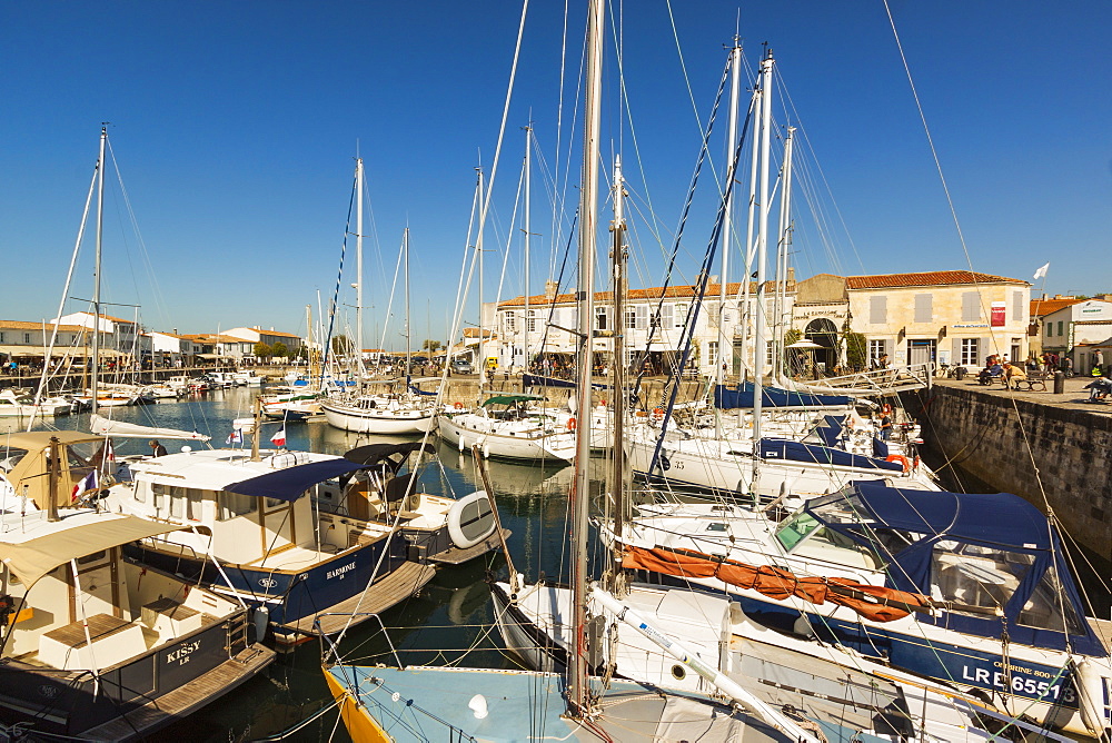 Yachts moored at the Quai de Bernonville in this north coast town, Saint Martin de Re, Ile de Re, Charente-Maritime, France, Europe