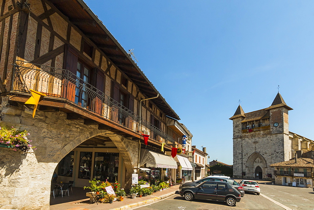 Place de la Liberation and the Church of Notre Dame in this south western historic bastide town, Villereal, Lot-et-Garonne, France, Europe