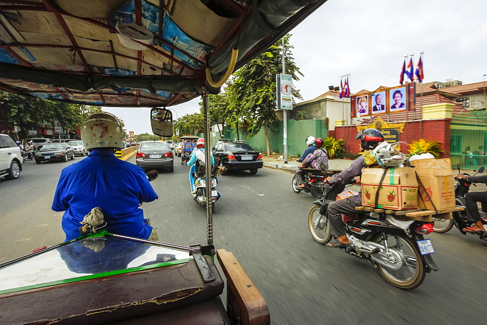 Passenger view from moving remork-moto (motorcycle and carriage), typical cheap transport here, City centre, Phnom Penh, Cambodia, Indochina, Southeast Asia, Asia