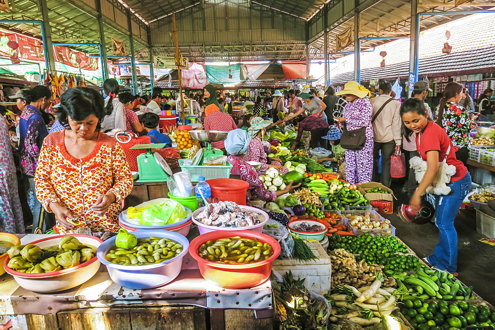 Vegetable stall at the central market in this old formerly French colonial river port city, Kampot, Cambodia, Indochina, Southeast Asia, Asia