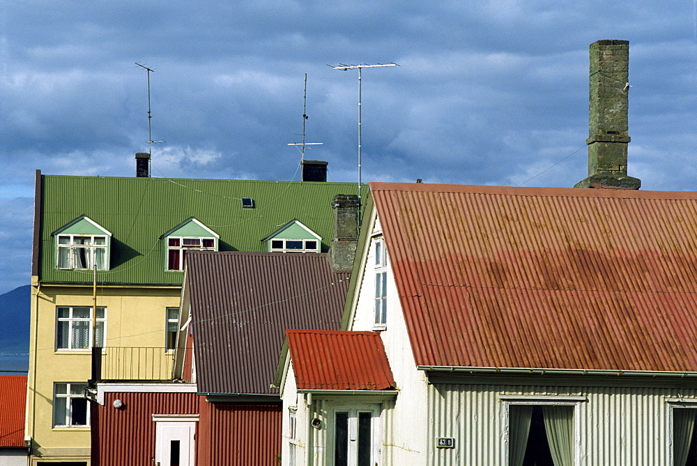 Typical colourful corrugated buildings which are a familiar sight in the city centre of Reykjavik, Iceland, Polar Regions