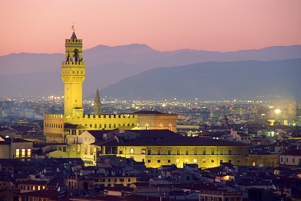 The Palazzo Vecchio, seen illuminated at dusk from the Piazzale Michelangelo, Florence, Tuscany, Italy, Europe