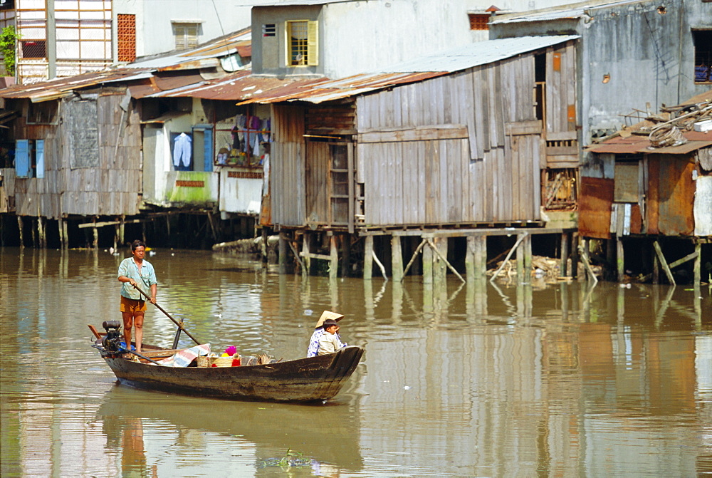 Boat on the Kinh Ben Nghe, a tributary of the Saigon River, Ho Chi Minh City, formerly Saigon, Vietnam, Asia