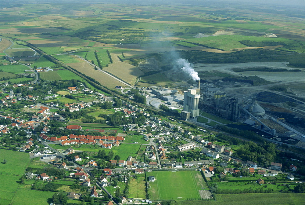 Aerial of a cement works and railway line at Dannes, north of Le Touquet in the Pas-de-Calais, France, Europe