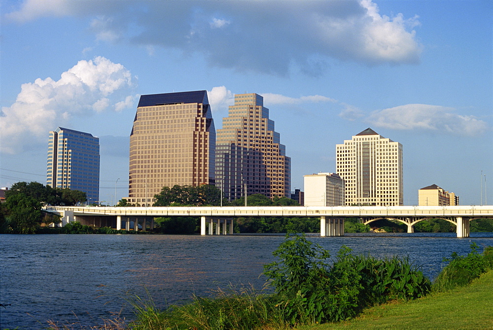 The river, bridge and skyline of downtown in the state capital, looking from Riverside, Austin, Texas, United States of America, North America