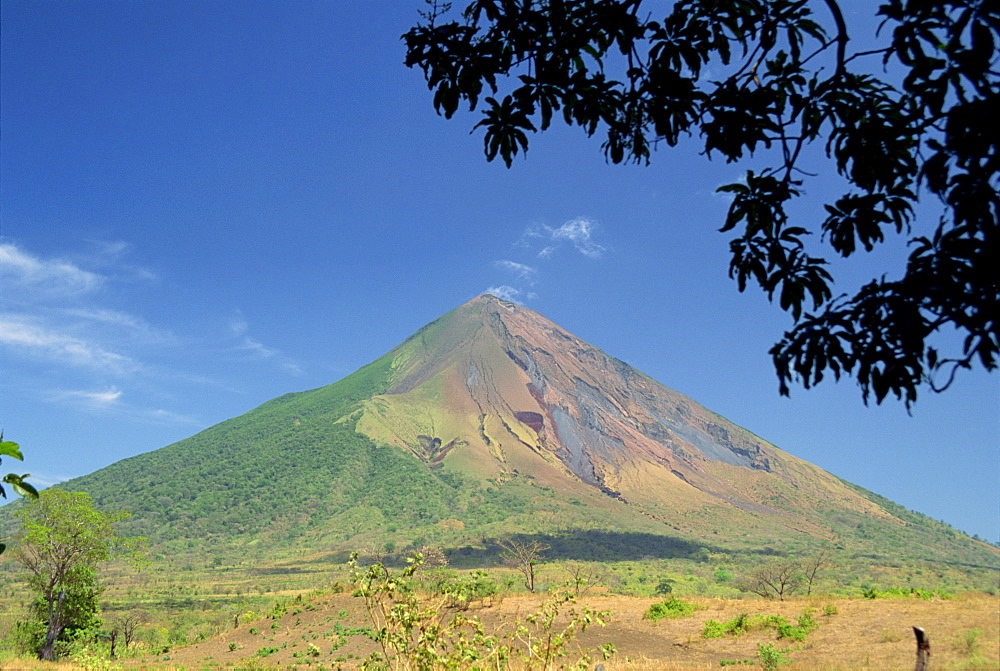 The perfect cone of Volcan Concepcion, 1610m, one of two volcanoes that make up the island of Omotepe, Nicaragua, Central America