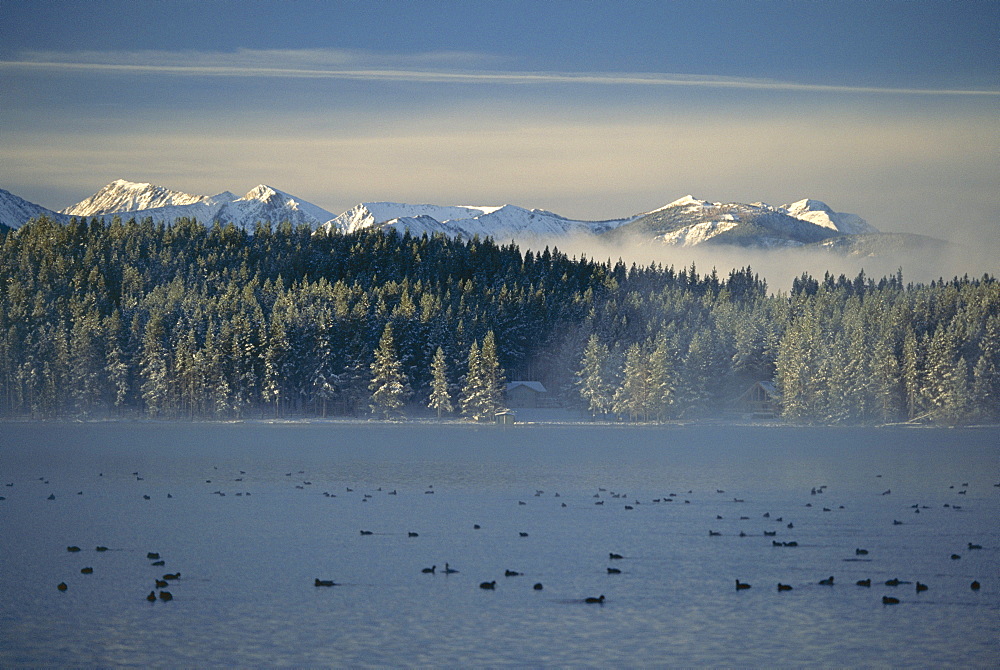 Dawn breaking over Georgetown Lake at Southern Cross, Rocky Mountains, west Montana, Montana, United States of America (USA), North America