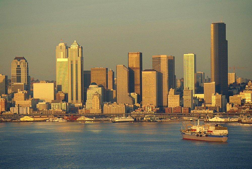 The harbour and city skyline, looking east across Elliot Bay to the tower blocks of downtown Seattle, Washington State, United State of America, North America