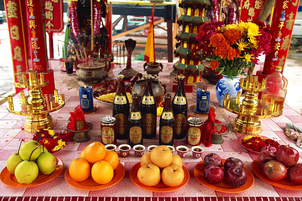 Offerings in Chinese temple during festival, Georgetown, Penang Island, Malaysia, Southeast Asia, Asia