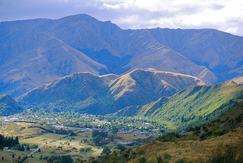 View west from the Crown Range towards Arrowtown, near Queenstown, west Otago, South Island, New Zealand, Pacific