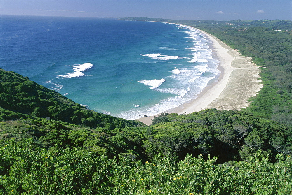 Looking south from Cape Byron to Tallow Beach, a surfing spot east of the resort of Byron Bay in the north east of the state, New South Wales (N.S.W.), Australia, Pacific