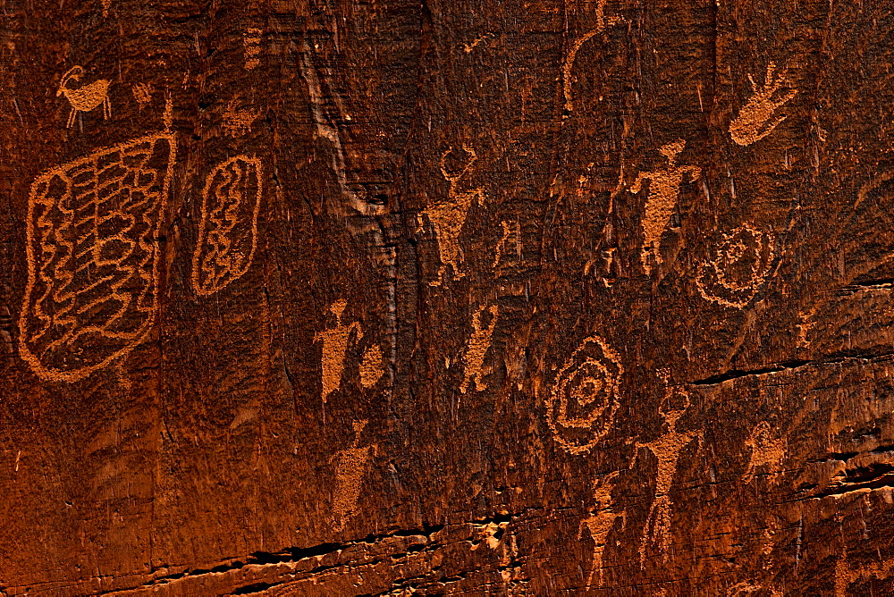 Horned anthropomorphs holding shields, Formative Period Petroglyphs, Utah Scenic Byway 279, Potash Road, Moab, Utah, United States of America, North America 