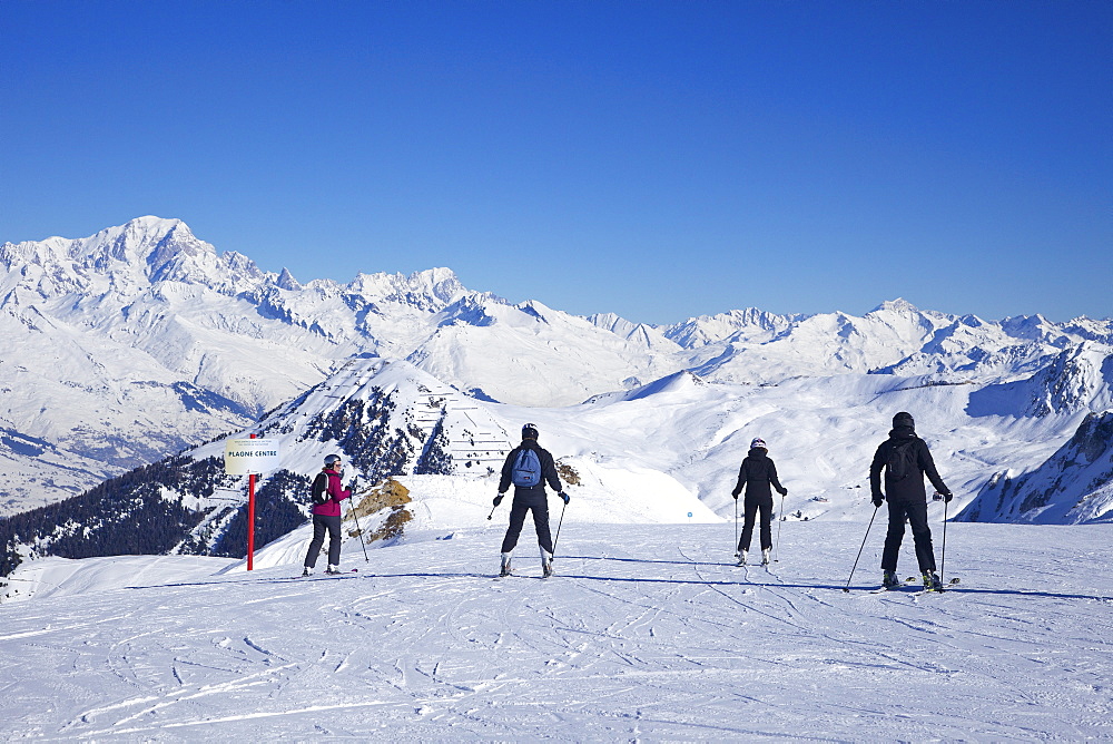 Skiers on the piste to Plagne Centre, La Plagne, French Alps, France, Europe 