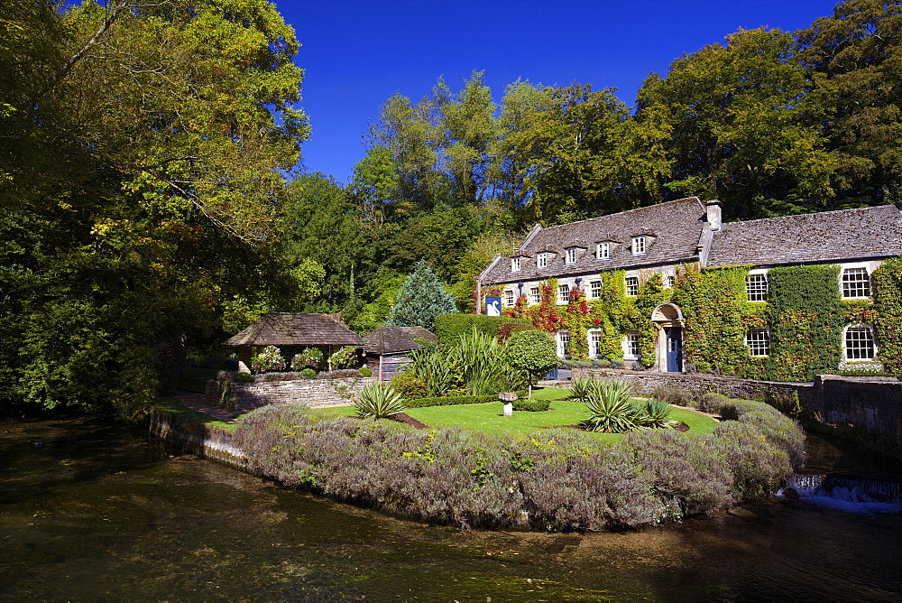 River Coln and Swan Hotel, Bibury, Cotswolds, Gloucestershire, England, United Kingdom, Europe