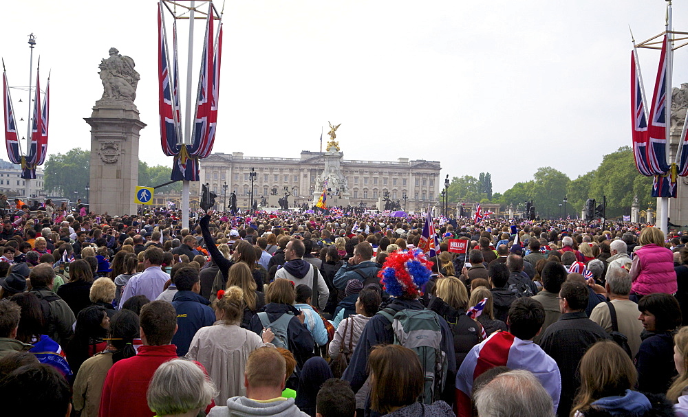 Crowds standing in the Mall outside Buckingham Palace on the day Prince William married Kate Middleton, 29th April 2011, London, England, United Kingdom, Europe