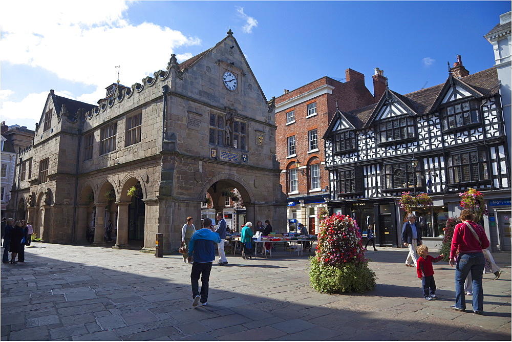 Old Market Hall and Square in summer sun, Shrewsbury, Shropshire, England, United Kingdom, Europe