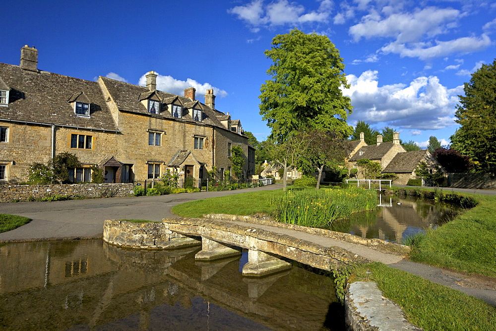 River Eye flowing through the pretty village of Lower Slaughter, the Cotswolds, Gloucestershire, England, United Kingdom, Europe