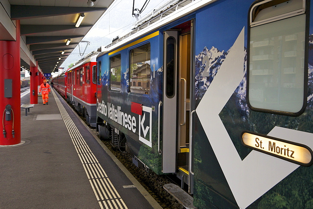 Bernina Express bound for St. Moritz, Switzerland, at Tirano station, Italy, Europe