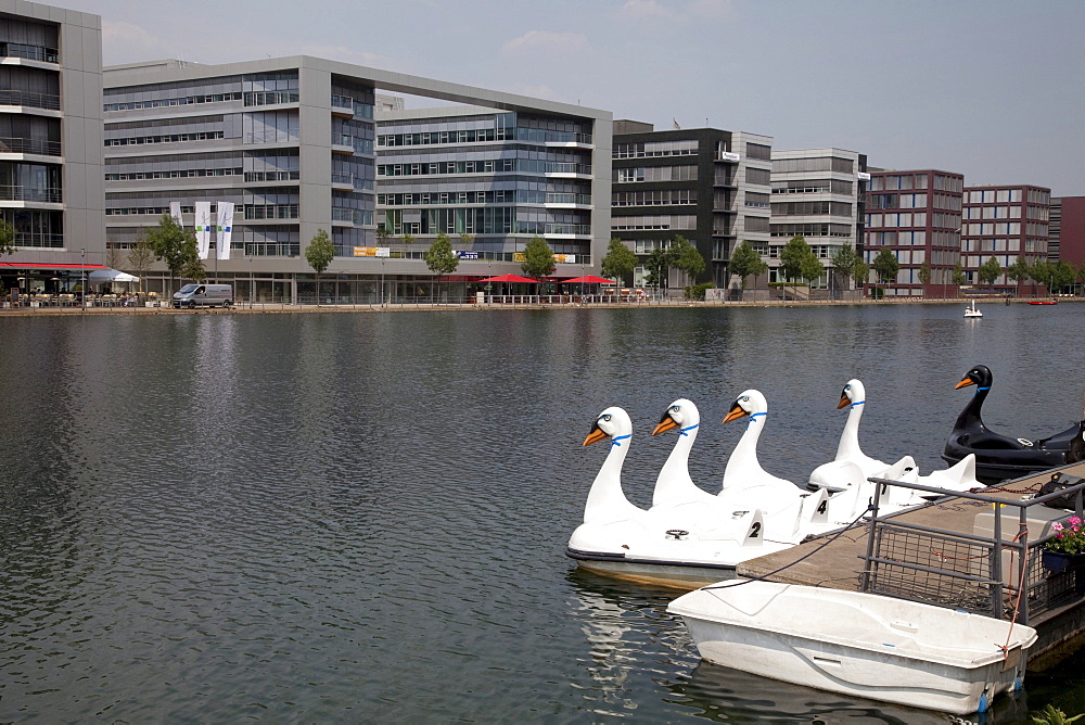 Pedal boats and modern architecture, office buildings, inner harbour, Duisburg, Ruhrgebiet region, North Rhine-Westphalia, Germany, Europe