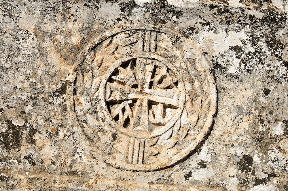 Christian ornament on a house ruin at the archeological site of Serjilla, Dead Cities, Syria, Middle East, West Asia