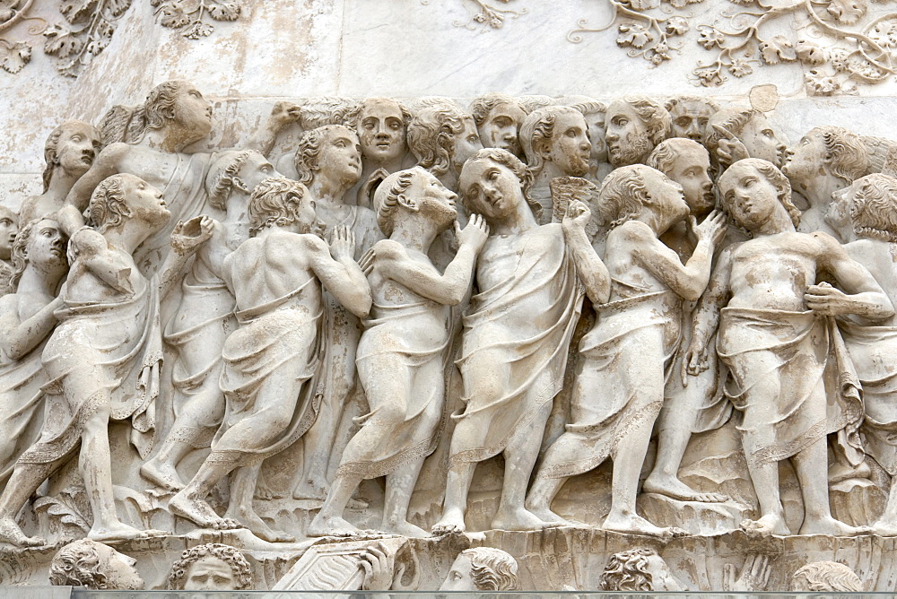 Detail of the bas-relief on the fourth pillar-pinnacle, doomsday, showing the "chosen ones", "Gli Eletti", facade of the Duomo, cathedral, in Orvieto, province of Terni, Umbria, Italy, Europe