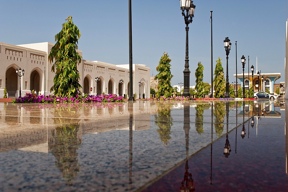 Main building of the Al Alam Palace, with reflection on the shiny polished tiles of the entranceway, Muscat, Oman, Middle East