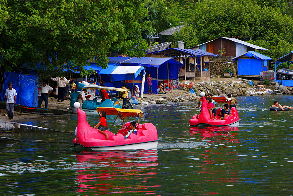 Pedalos on the beach, Samosir Island, Lake Toba, Batak region, Sumatra, Indonesia, Southeast Asia, Asia