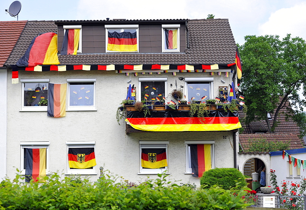 House decorated with German flags during Football World Cup 2010, Stuttgart, Baden-Wuerttemberg, Germany, Europe