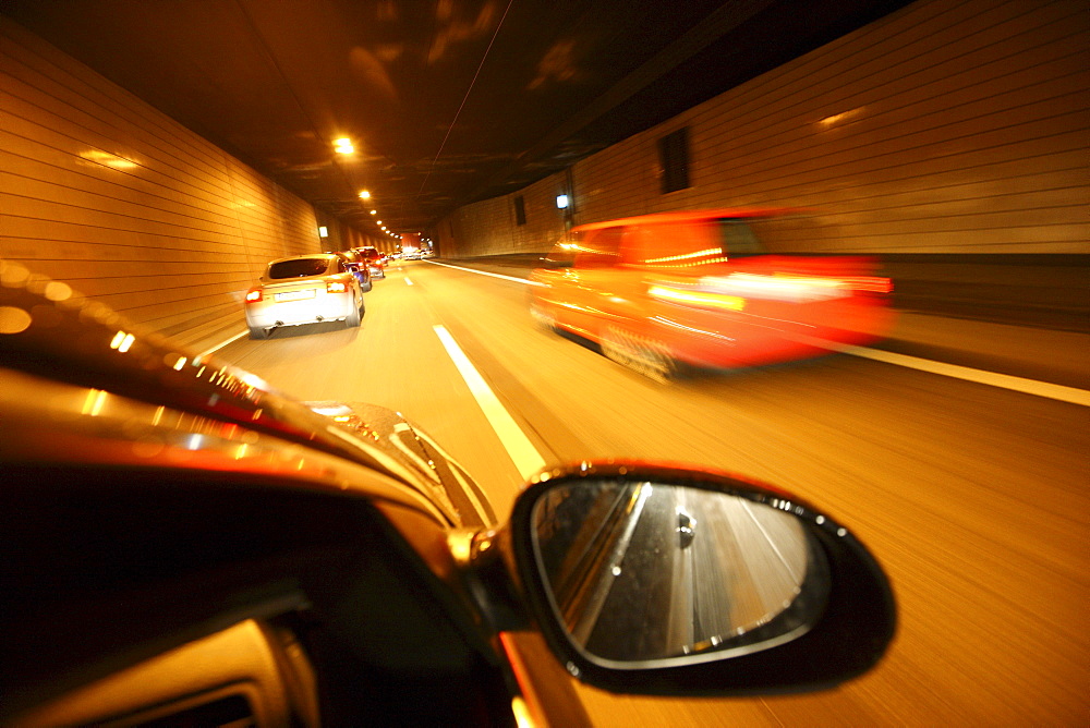 Drive during rush hour on the highway A40, so-called Ruhrschnellweg, city tunnel Essen, Ruhrgebiet region, North Rhine-Westphalia, Germany, Europe