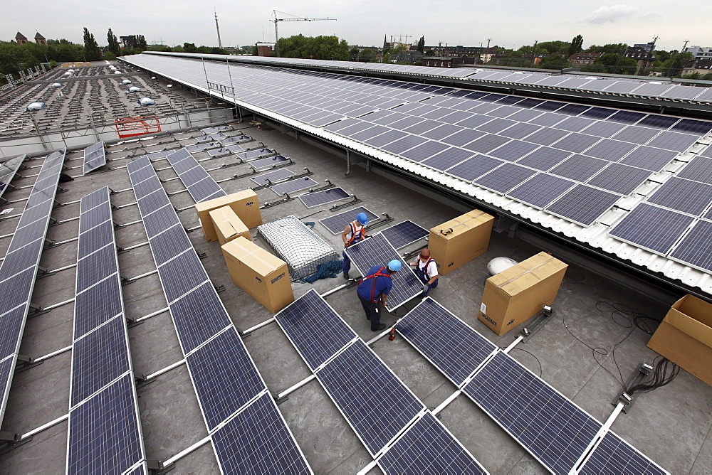 Construction of a large photovoltaic system on several rooftops, 16000 square metres, Gelsenkirchen, North Rhine-Westphalia, Germany, Europe