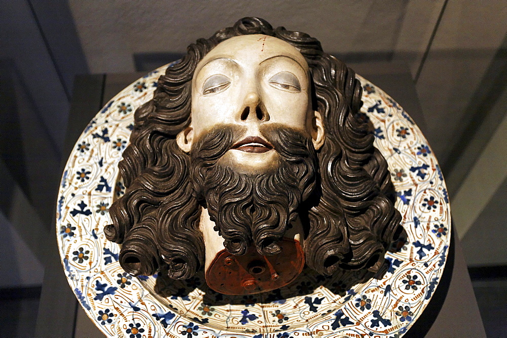 Severed head of John the Baptist lying on a plate, wood sculpture, Stiftsmuseum Museum Xanten monastery museum, Xanten, Niederrhein region, North Rhine-Westphalia, Germany, Europe