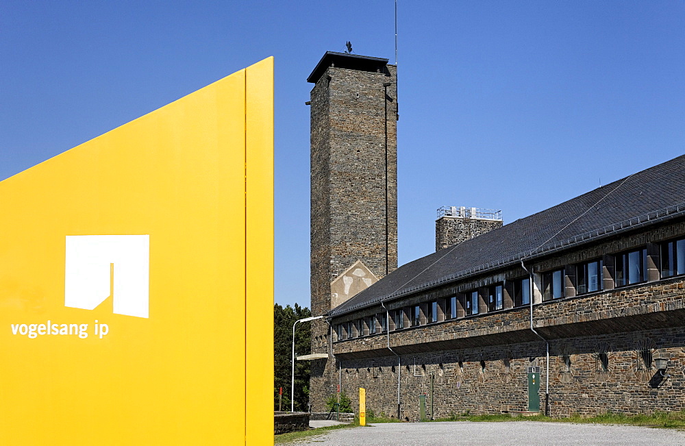 Former NS-Ordensburg, modern design object with a gateway and the logo Vogelsang IP, International Place in Eifel National Park, Schleiden-Gemuend, North Rhine-Westphalia, Germany, Europe