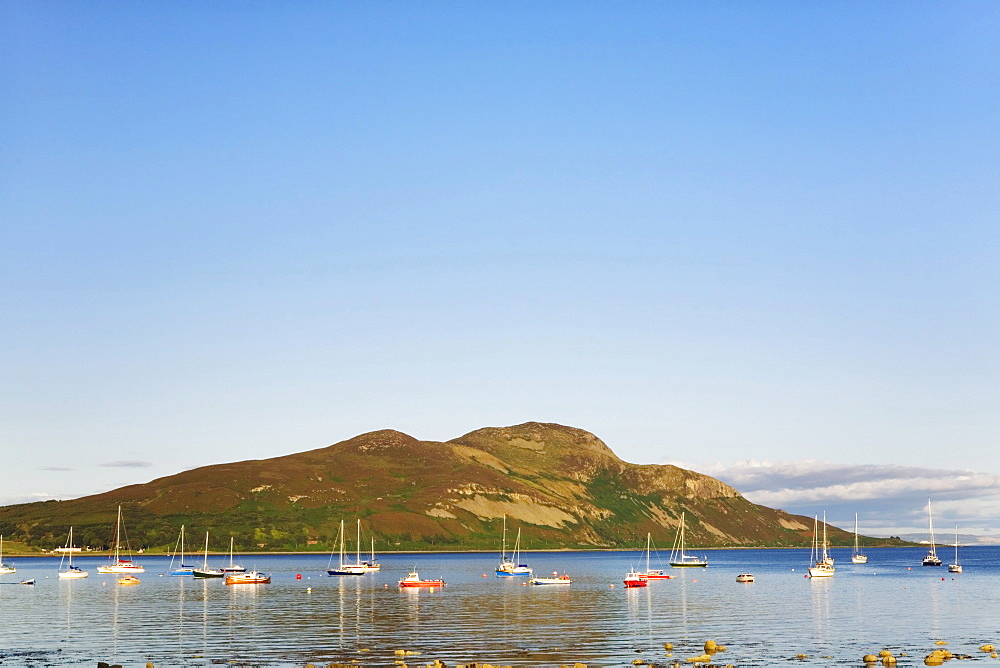 Boats in the bay of Lamlash in front of Holy Island, Isle of Arran, Scotland, United Kingdom, Europe