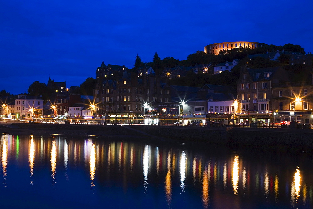 Oban with the promenade and McCaig's Tower at night, Argyll, Scotland, United Kingdom, Europe