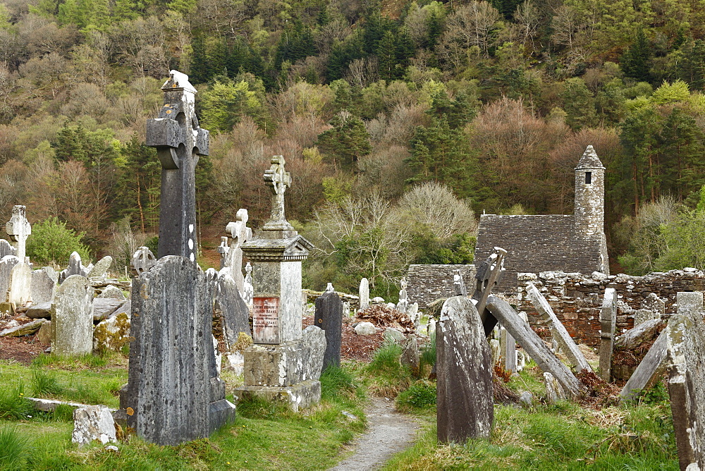 Chapel of St. Kevin's Kitchen and cemetery, former monastery Glendalough, Wicklow Mountains, County Wicklow, Republic of Ireland, British Isles, Europe