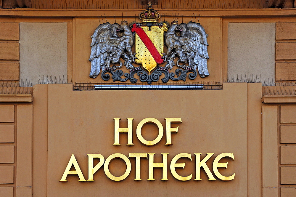 Royal coat of arms and logo of the old Hof Apotheke pharmacy, Sofienstrasse 11, Heidelberg, Baden-Wuerttemberg, Germany, Europe