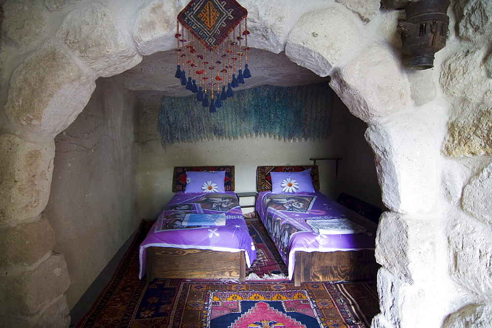 Hotel room in a cave hotel in Ortahisar, Cappadocia, Anatolia, Turkey, Asia